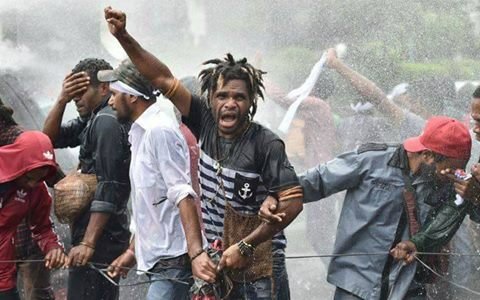 Papuan students across Indonesia protest the murder of half a million of their people