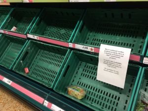Empty UK supermarket shelves